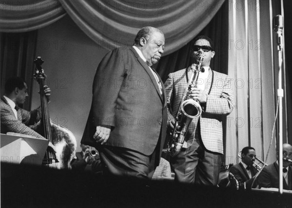 Jimmy Rushing and the Basie Band; with Frank Wess, London, 1963. Creator: Brian Foskett.
