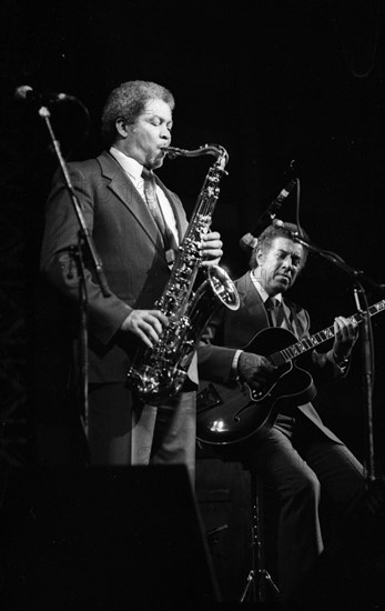 Frank Foster and Kenny Burrell, Dominion Theatre, London, Nov 1985. Creator: Brian O'Connor.