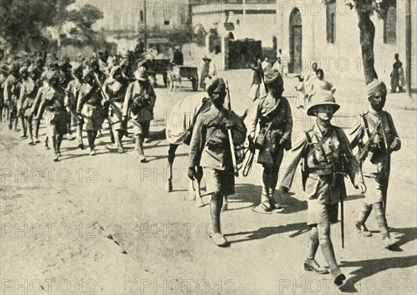 Indian soldiers and British officer, First World War, 1914-1918, (c1920). Creator: Unknown.