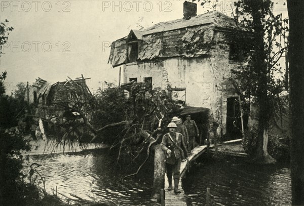 'In the Ypres Salient: British troops leaving their billets...', First World War, 1917, (c1920). Creator: Unknown.