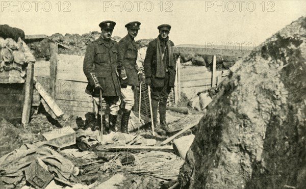 'Inspecting One of the German Trenches after its Capture', First World War, 1917, (c1920). Creator: Unknown.