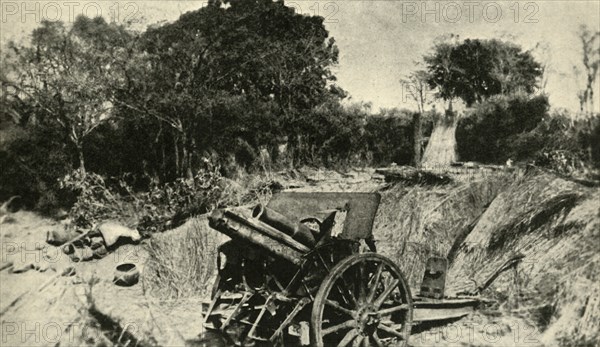 'A German Gun Position in the Heart of the Jungle: one of the 4.1 howitzers captured in East Africa' Creator: Unknown.