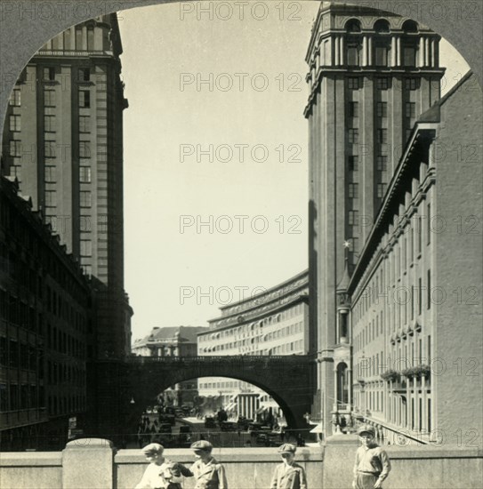 'From Regeringsgatan down on Kungsgatan and its two Skyscrapers, Stockholm, Sweden', c1930s. Creator: Unknown.