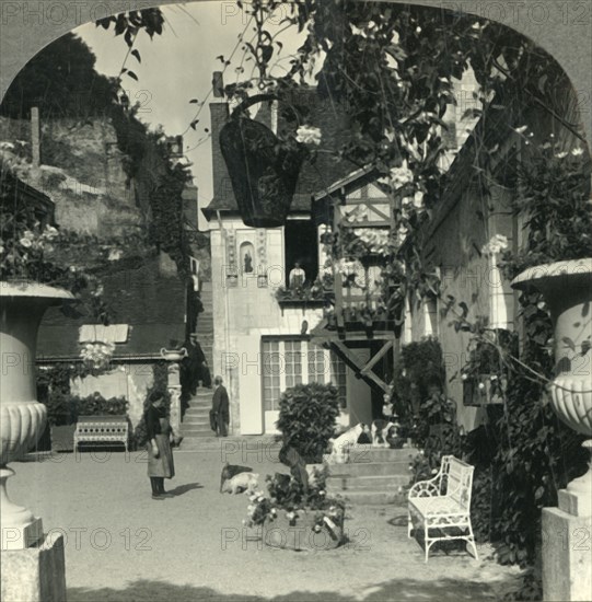 'A Touraine Old-World Courtyard in the Village of Vouvray, France - the Cateau Country of the Loire' Creator: Unknown.