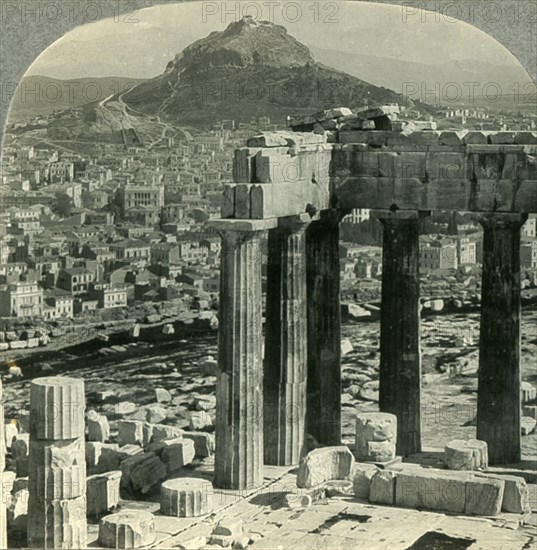 'The Parthenon on the Acropolis - View N.E. over Athenai (Athens) to Mount Lycabettus, Greece', c193 Creator: Unknown.
