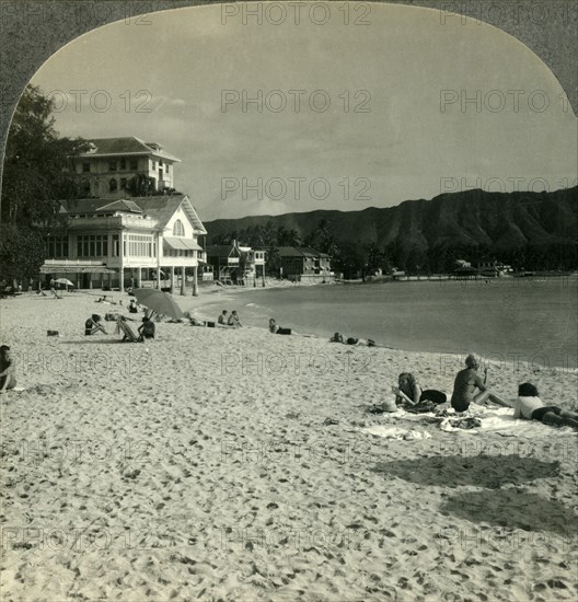 'On the Sands of Waikiki Beach, near Honolulu, Hawaii', c1930s. Creator: Unknown.