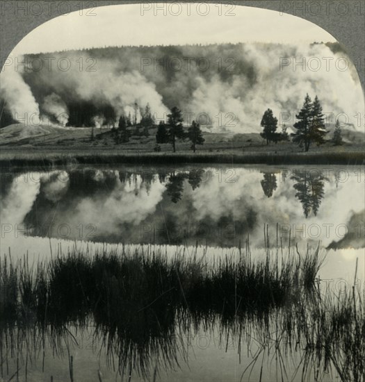 'Sunrise in Yellowstone Park, over Upper Geyser Basin, Wyoming', c1930s. Creator: Unknown.