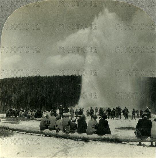 'The Most Famous Sight in Yellowstone Park, "Old Faithful" Geyser in Action', c1930s. Creator: Unknown.