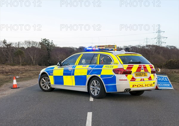 Police car and ambulance attending road traffic accident 2018. Creator: Unknown.