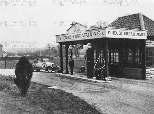 1923 Calcott 10hp at petrol station. Creator: Unknown.