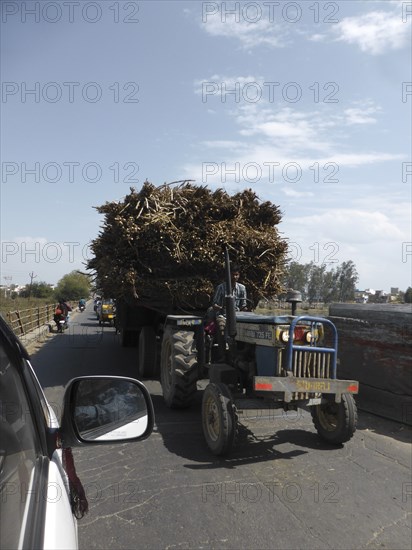 Tractor loaded with sugar cane, Uttarakhand, India. Creator: Unknown.