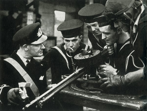 Machine-gun instruction, Fleet Air Arm, c1943. Creator: Unknown.