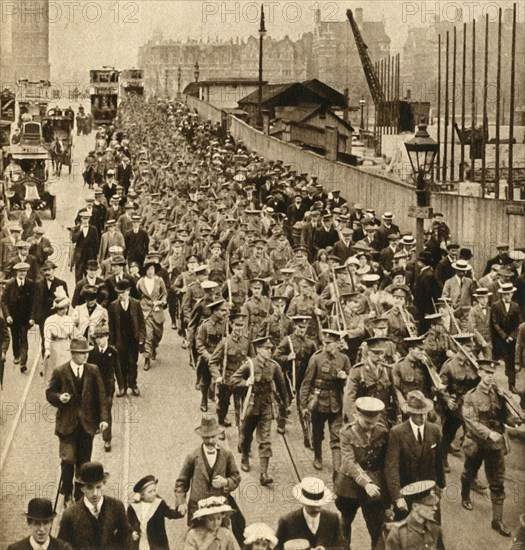 'Territorials from Summer Camp - Terriers marching easy over Westminster Bridge', 1914-1918, (1933). Creator: Unknown.