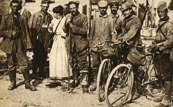 Wounded German prisoners are cared for by the Red Cross, France, First World War, 1914-1918, (1933). Creator: Unknown.