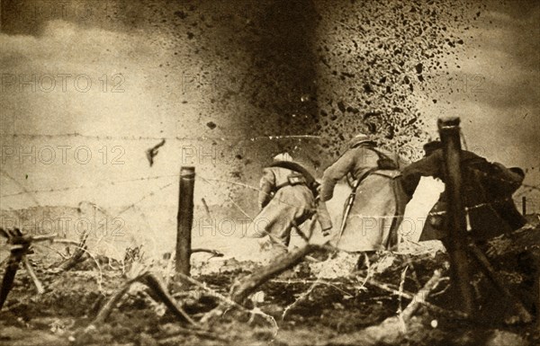 'An H.E. shell exploding', First World War, 1914-1918, (1933). Creator: Unknown.