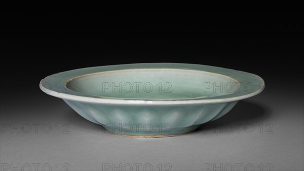 Dish with Two Fish in Relief: Longquan Ware, early 14th Century. Creator: Unknown.