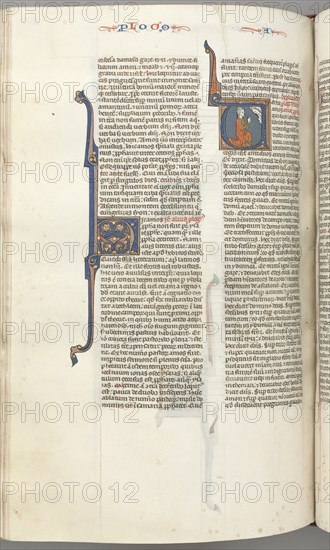 Fol. 354v, Amos, historiated initial V, Amos kneeling in prayer, bust of God above, c. 1275-1300. Creator: Unknown.