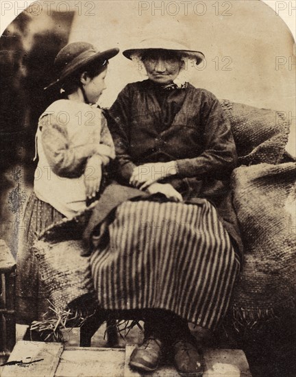 Servants at Rhagatt, Corwen, North Wales, c. 1860. Creator: John Lloyd (British, 1865).