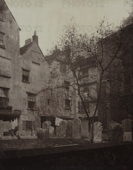 St. Bartholomews: The Churchyard Looking towards Cloth Fair, 1877. Creator: Alfred H. Bool (British); John Bool (British), and ; album issued by The Society for Photographing the Relics of Old London; Henry Dixon (British (modern), 1820-1893).