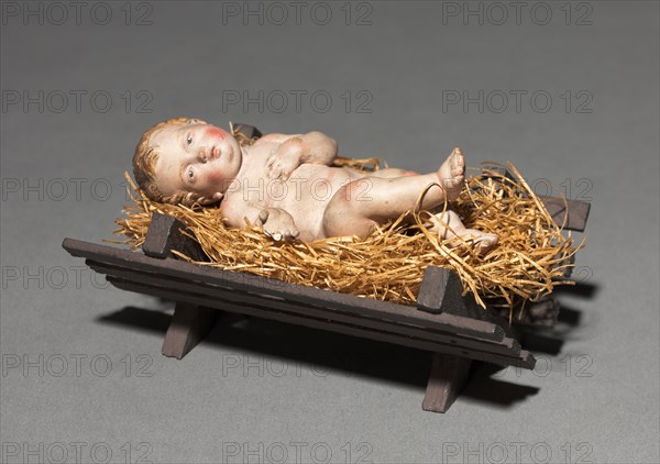 Figure from a Crèche: Infant Christ with Crib and Straw, 1780-1830. Creator: Unknown.