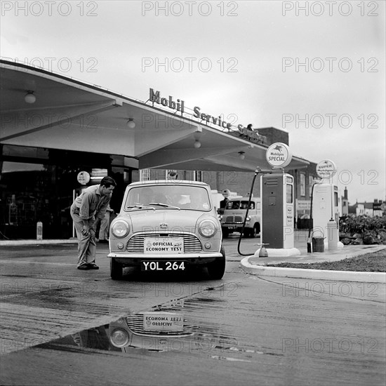 Mini on the 1959 Mobil Economy Run, re- fuelling. Creator: Unknown.