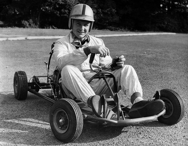 Bruce McLaren on his Em-Bee Wasp kart. Creator: Unknown.