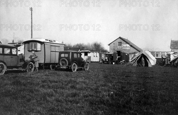 Voyageur caravan with Austin Seven on campsite  early 1930's. Creator: Unknown.