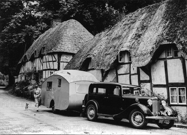 1936 Austin Twenty with caravan. Creator: Unknown.