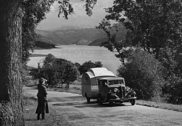 1934 Standard Sixteen with caravan. Creator: Unknown.