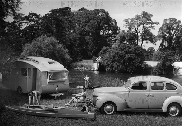 1939 Ford V8-91 with caravan. Creator: Unknown.