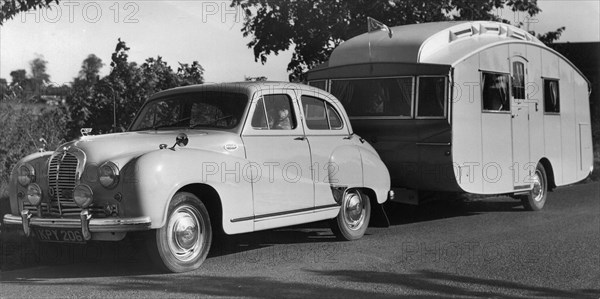 1951 Austin A70 Hereford with caravan. Creator: Unknown.