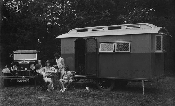 1930 Morris Oxfor Six with caravan. Creator: Unknown.