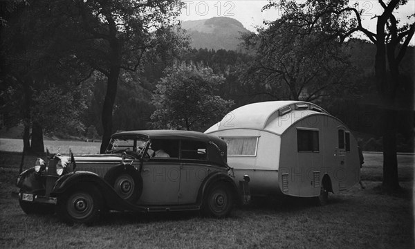 1937 Mercedes Benz 260D Cabriolet towing caravan. Creator: Unknown.