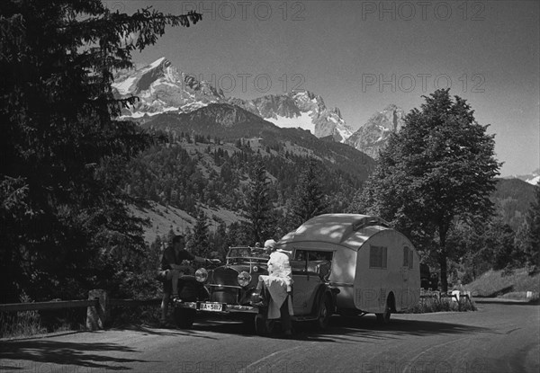 1937 Mercedes Benz 260D Cabriolet towing caravan. Creator: Unknown.