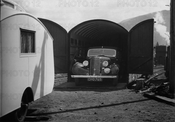 1937 Hillman 14 in rail transportation carriage van. Creator: Unknown.