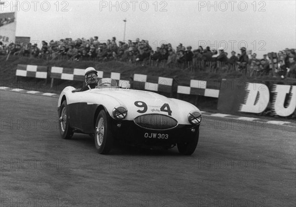 1955 Austin - Healey 100S, driven by Crabbe at Brands Hatch. Creator: Unknown.