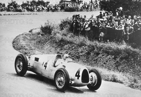 1936 Auto Union C type, Rosemeyer at German Grand Prix. Creator: Unknown.