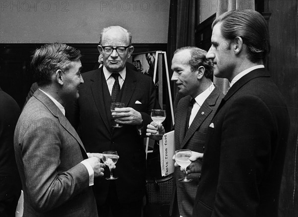 Walter Hayes, Patrick Hennesey, Colin Chapman, Graham Hill. Creator: Unknown.