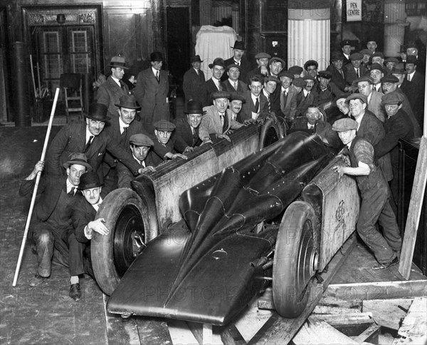 Golden Arrow with crowd of people after unpacking from crate 1929. Creator: Unknown.