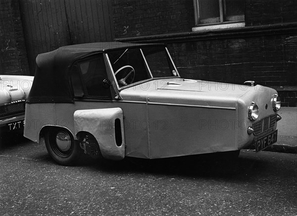 1956 Gordon 3 wheeler parked in street. Creator: Unknown.