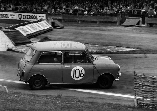 Morris Mini skidding at chicane, Goodwood 1961. Creator: Unknown.