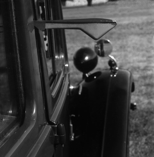 Semaphore indicator arm on 1937 Morris 8 series II. Creator: Unknown.