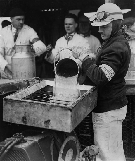 Frank Clement refuelling Bentley at Brookland Double 12 race 1930. Creator: Unknown.