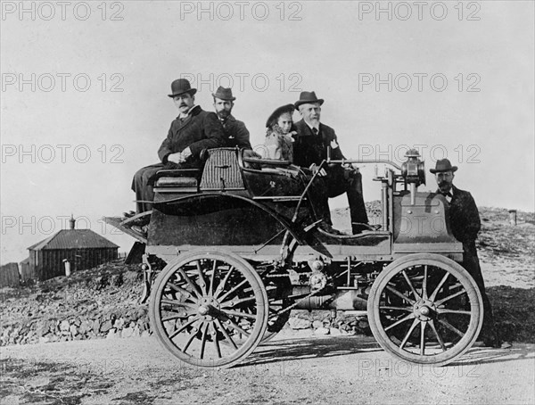 1896 Daimler, Hon. Evelyn Ellis with his daughter and J.S. Critchley, Daimler works manager. Creator: Unknown.