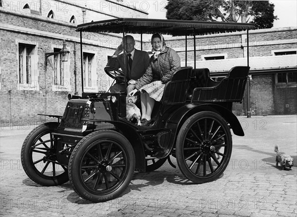 1900 Royal Daimler, with H.R.H. Queen Elizabeth with Lord Montagu in 1977. Creator: Unknown.
