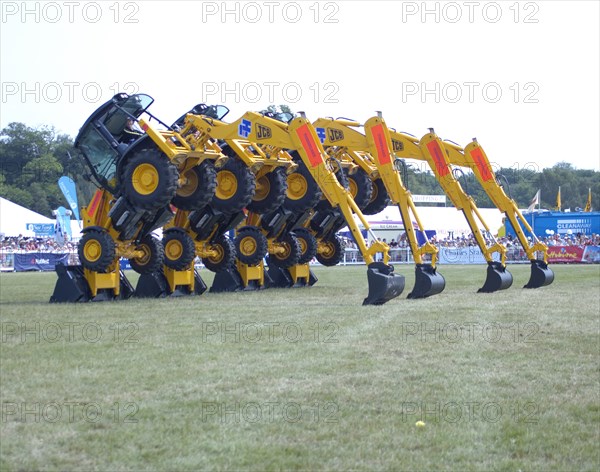 Stunt JCB diggers perfoming formation "dance" routine at New Forest show 2006. Creator: Unknown.