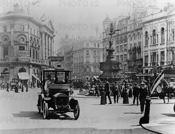 Unic taxi in Piccadilly circus, London circa 1910. Creator: Unknown.