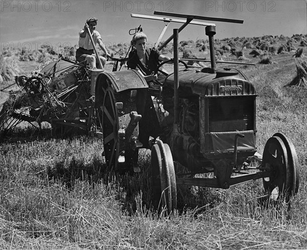 Fordson tractor, with Land girls 1940's. Creator: Unknown.
