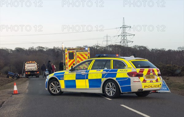 Police car and ambulance attending road traffic accident 2018. Creator: Unknown.