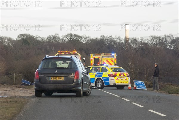 Police car and ambulance attending road traffic accident 2018. Creator: Unknown.